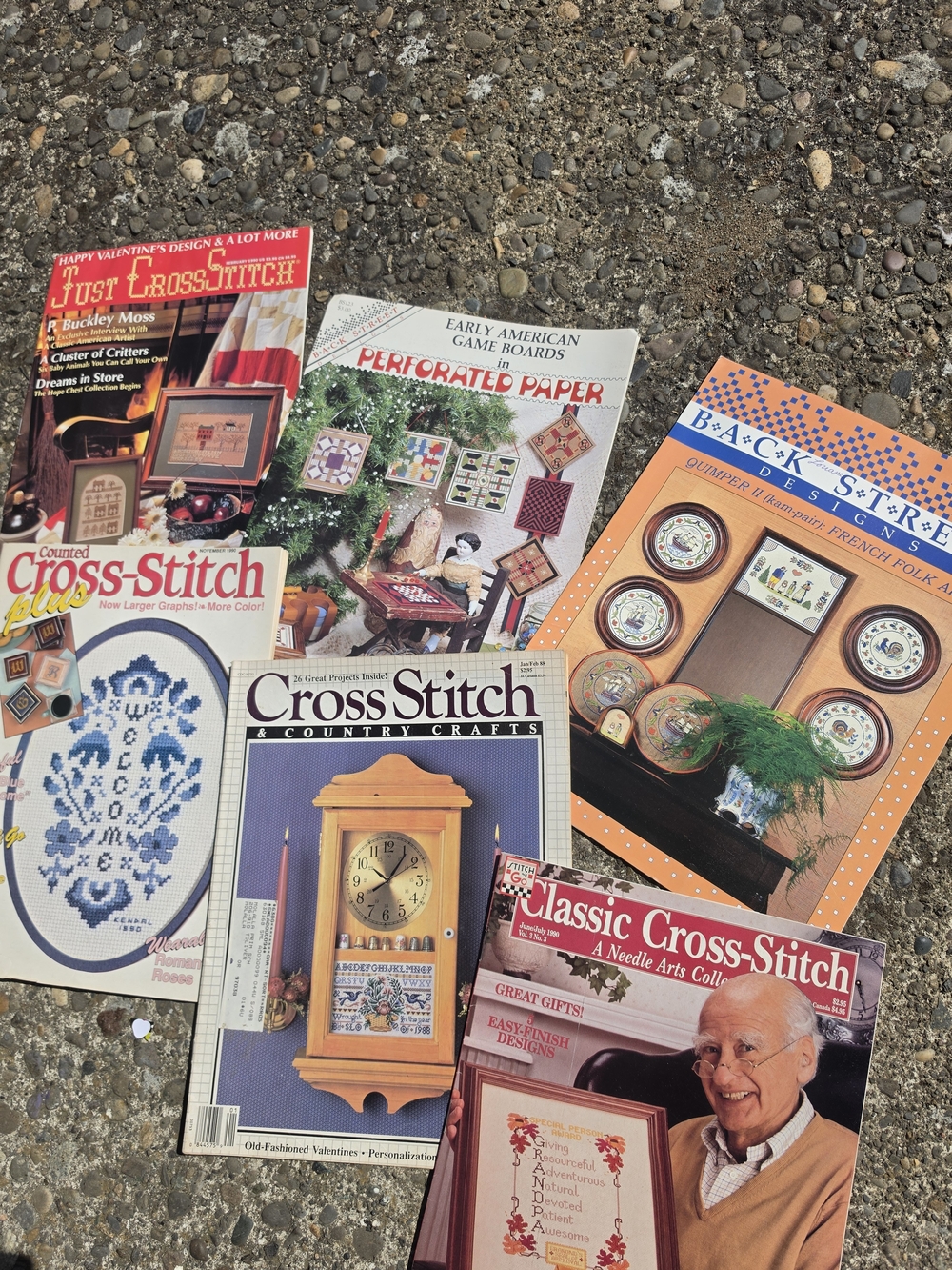 Assorted Cross-Stitch & Needlework Pattern Magazines - Blue, Red, Orange, Cream